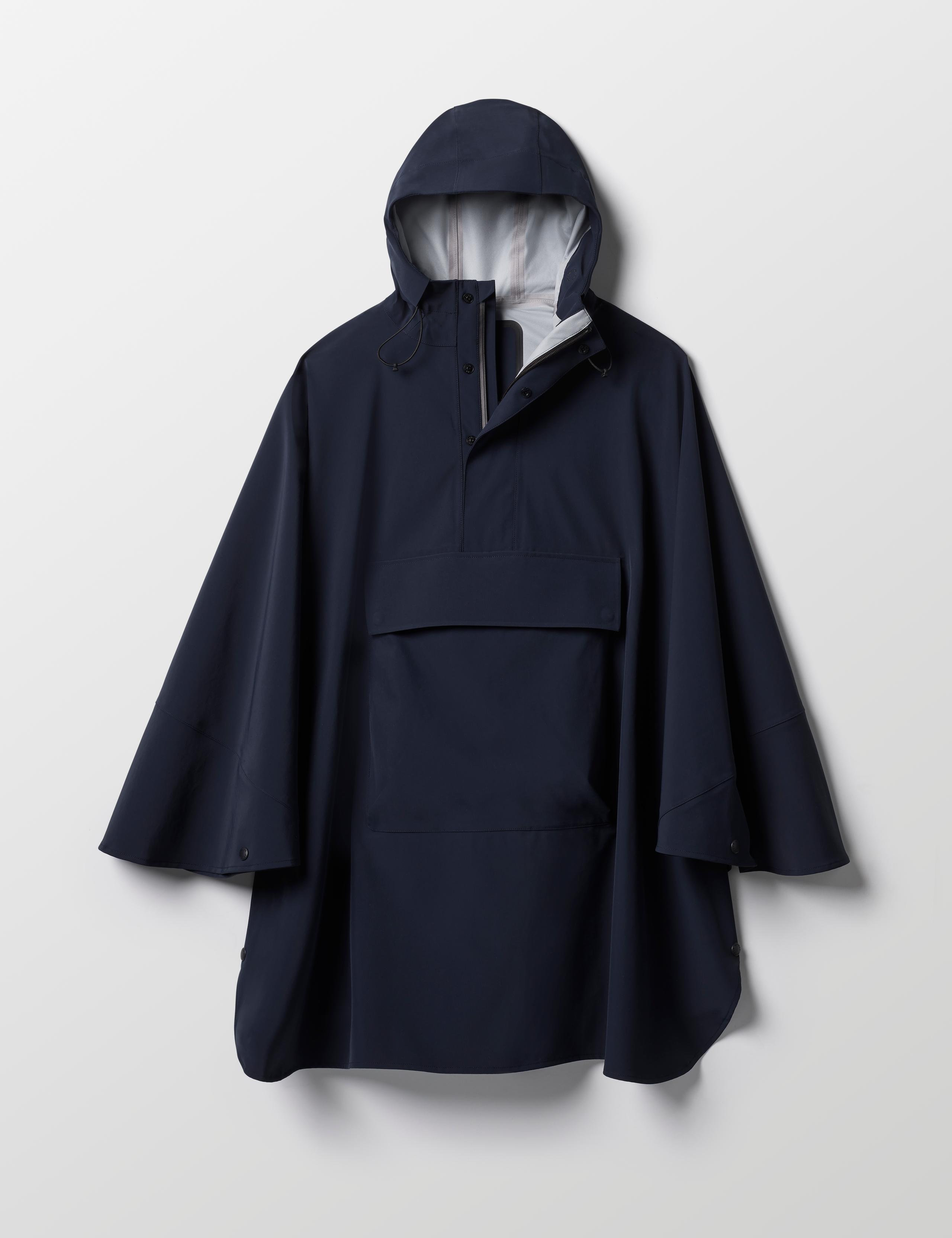 Studio laydown of Line Rain Poncho in Total Eclipse