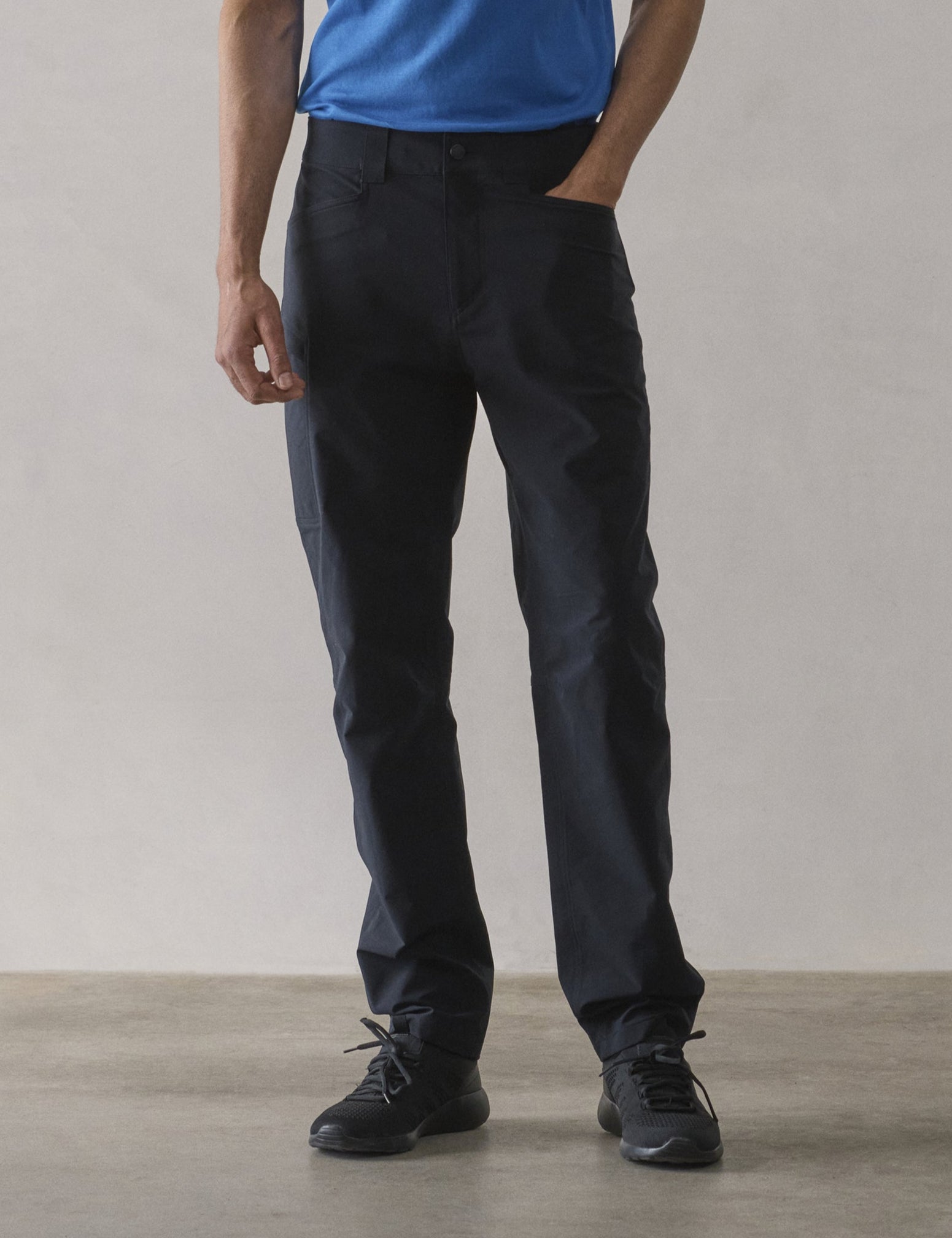 Front lower-body view of man wearing Adventure Pant in Onyx Black from AETHER Apparel.