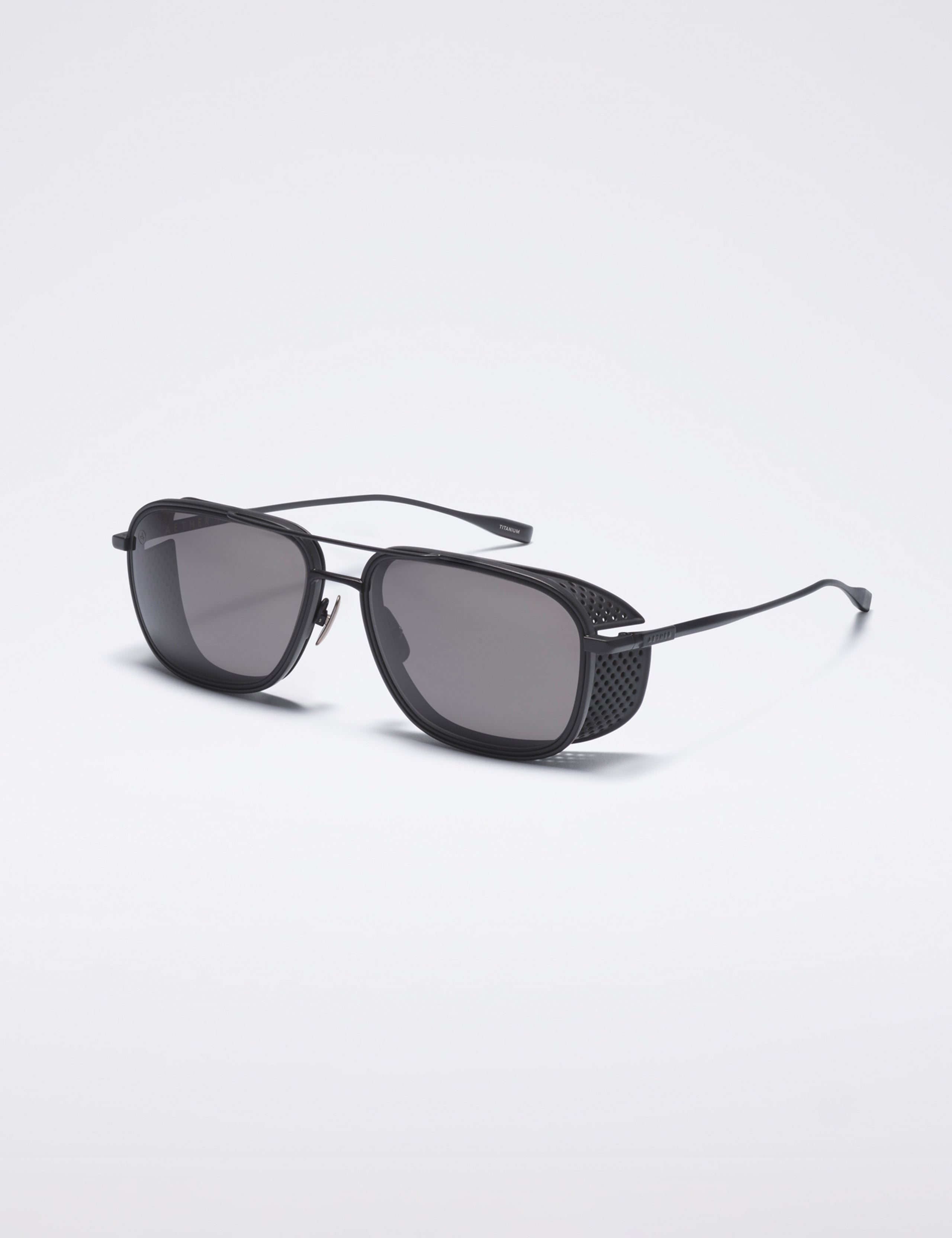 Front 3/4 view of Summit Sunglass in Black titanium with black lens from AETHER Apparel.